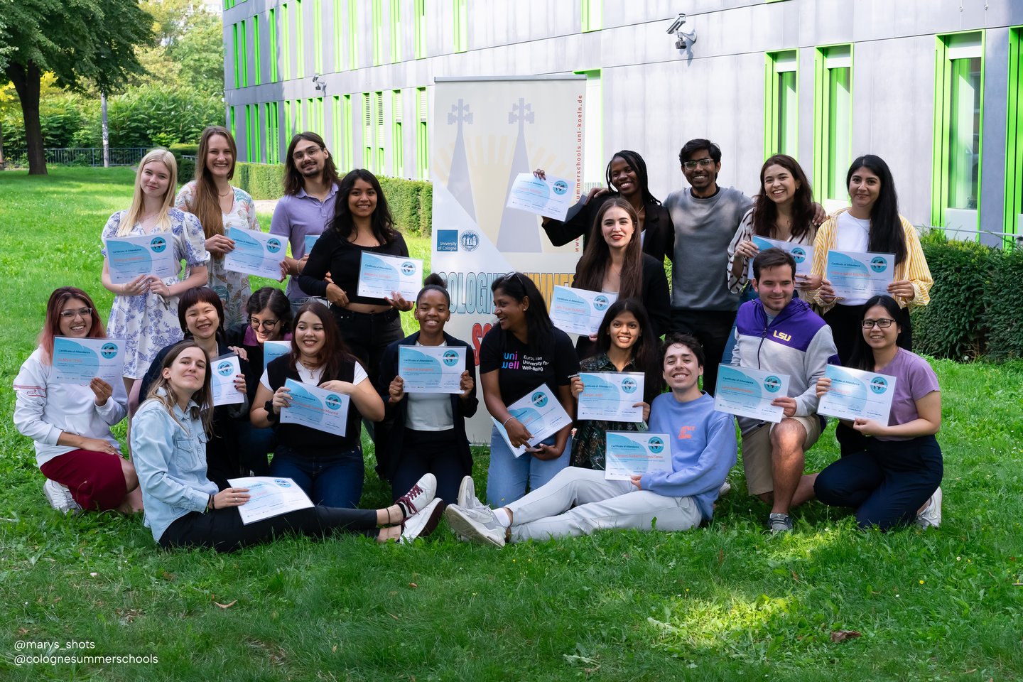 group picture with all onsite participants holding their certificates