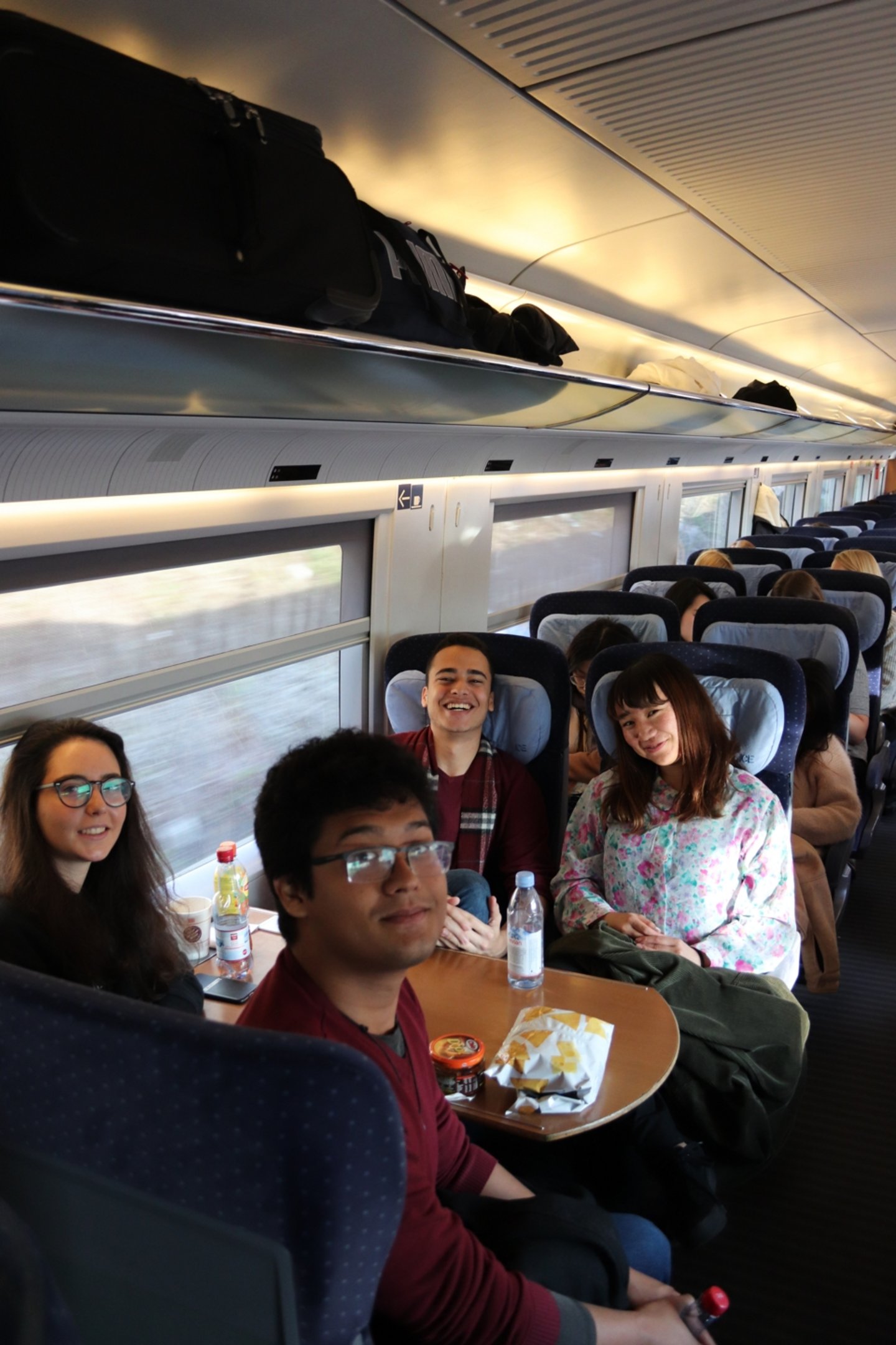 Students sitting in the train to Brussels
