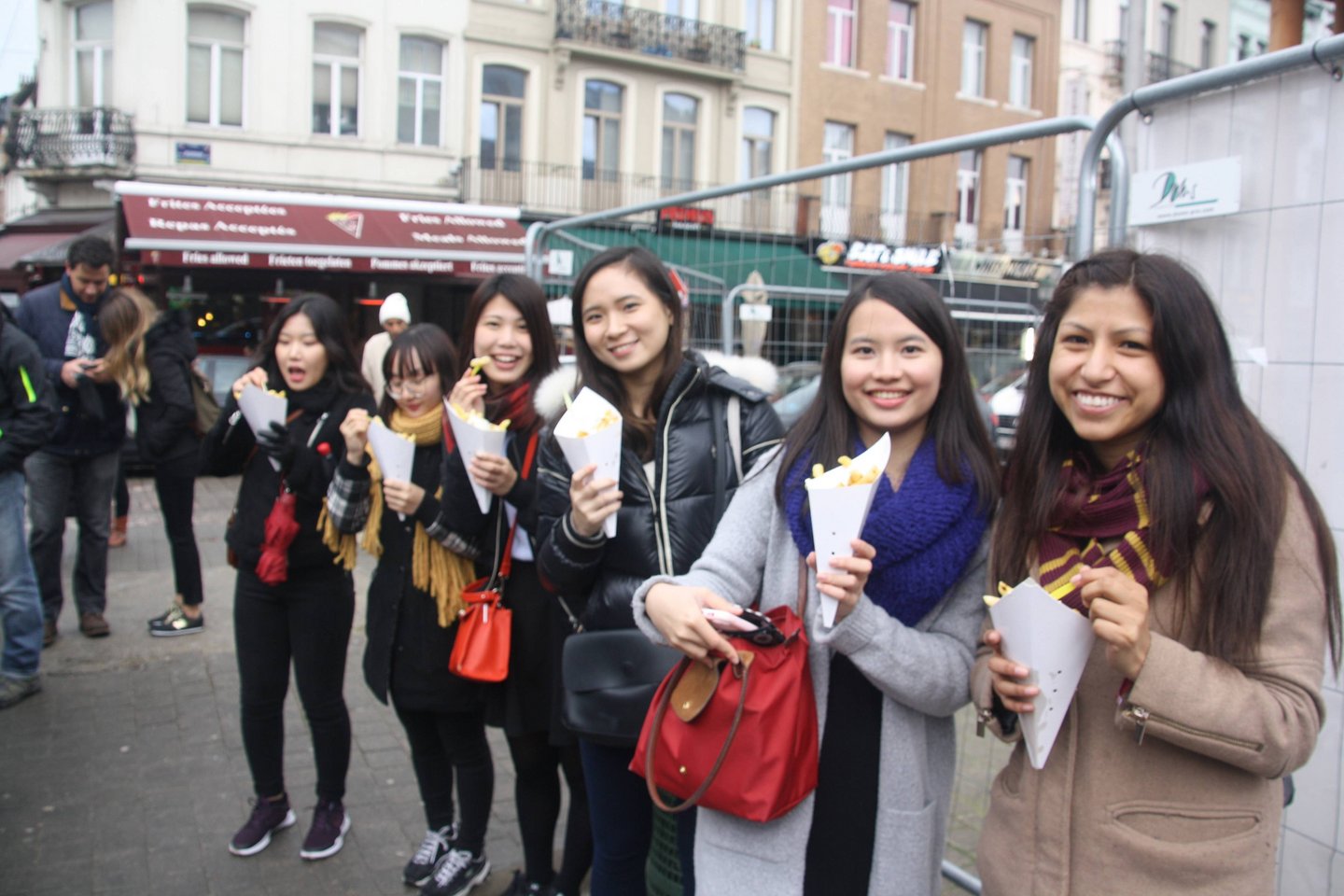 Six students with belgian fries