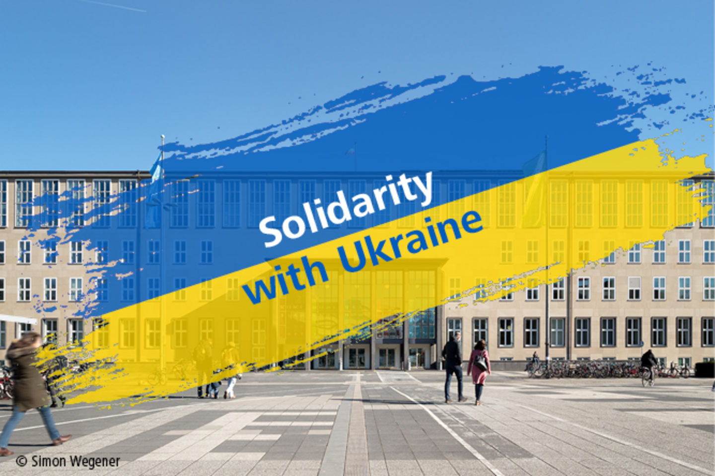 Uni Cologne Main Building with "Solidarity with Ukraine" written on the colours of the Ukrainian flag