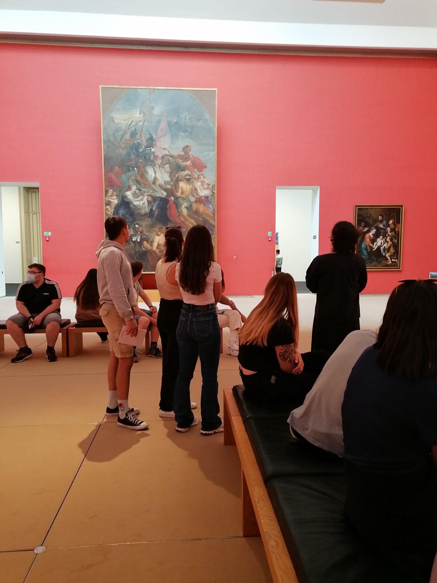 Students watching pictures in the museum