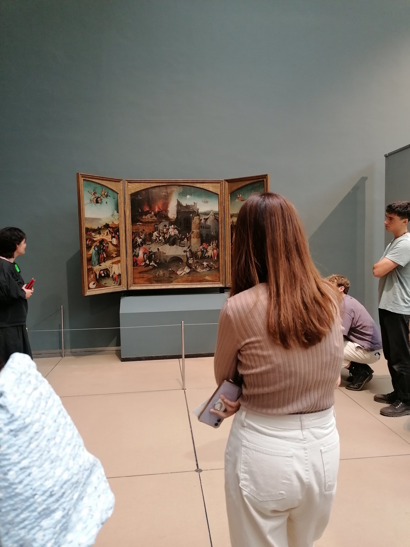Student looking at picture in a museum