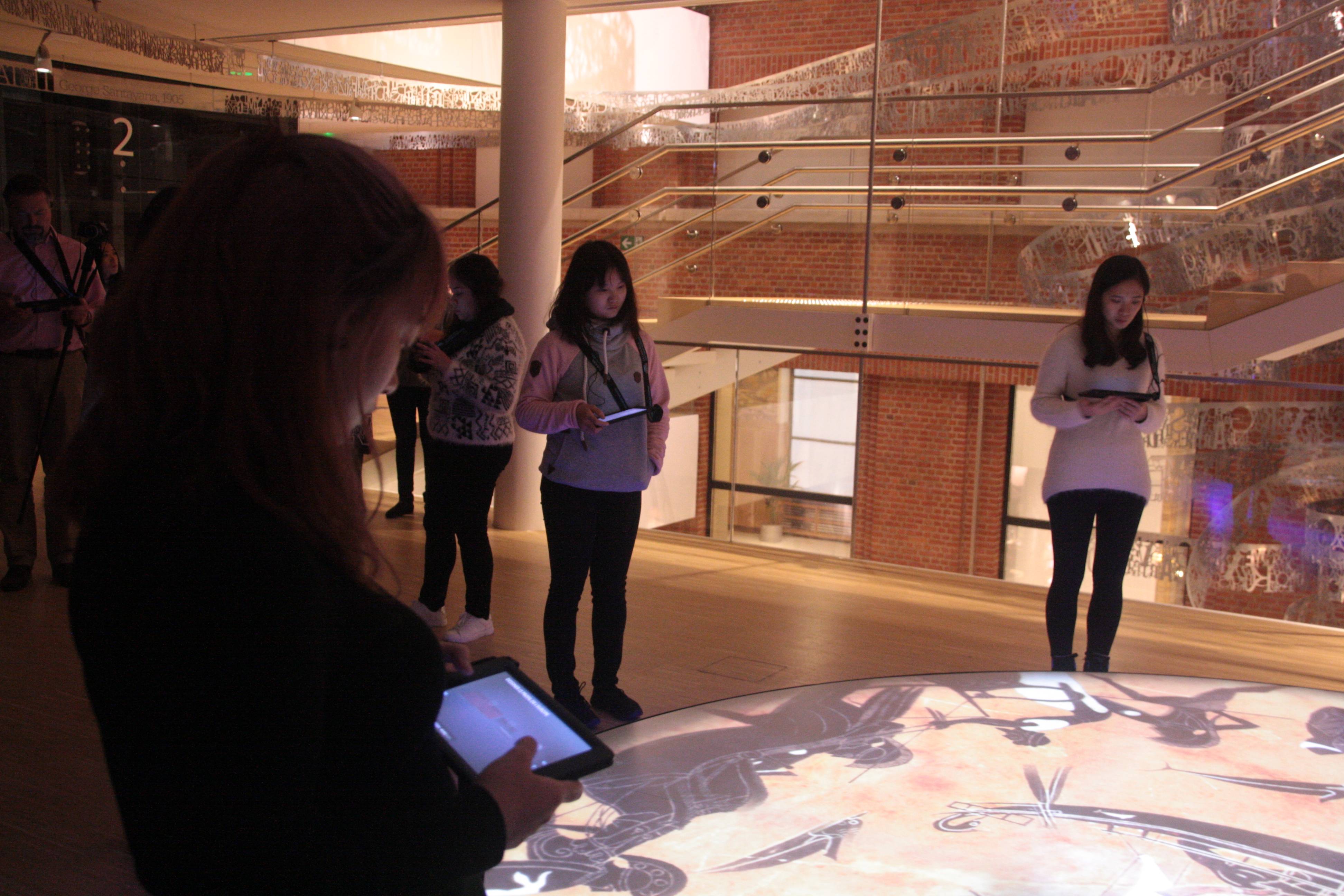 Students looking around in the House of European History